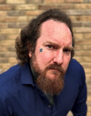  Artist Brandon Notch serious headshot 