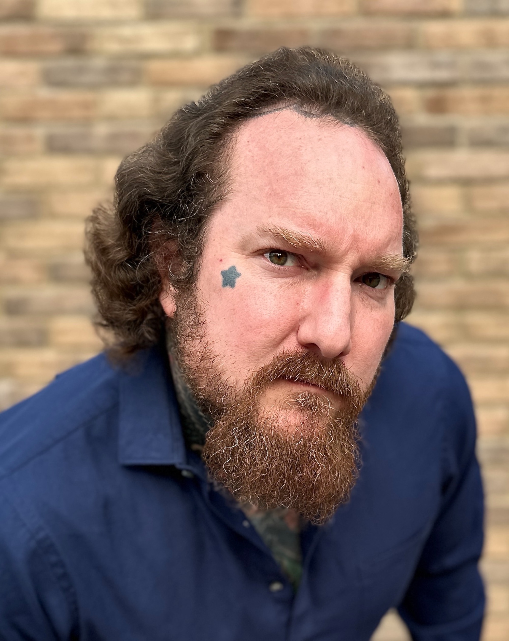  Artist Brandon Notch serious headshot 